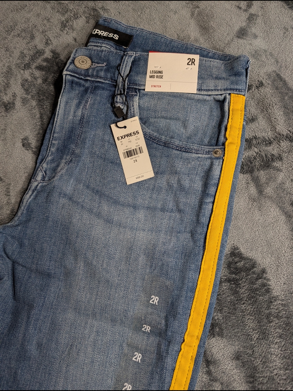 Express Women's Light Blue Mid-Rise Stretch Legging Jean with Yellow Side Stripe
